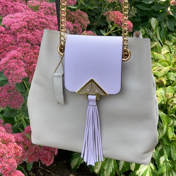 Dillards Handbags - Dillard’s lavender OTS or over the arm purse